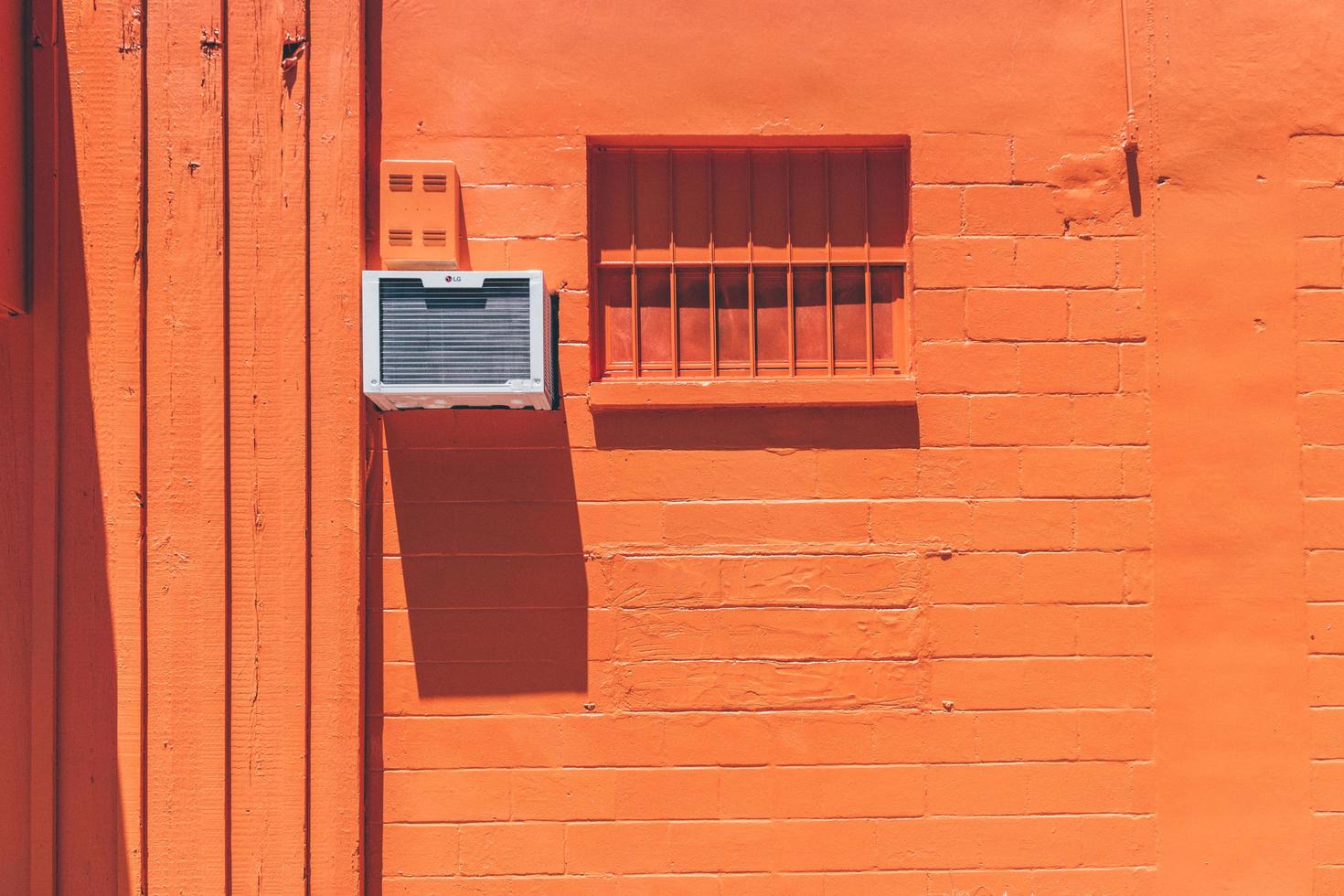 Orange Wall with AC Unit photo