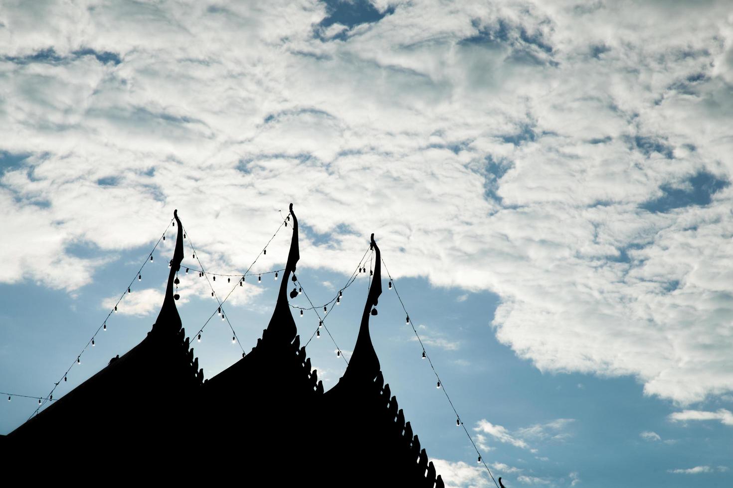 Silhouette of temple roof photo