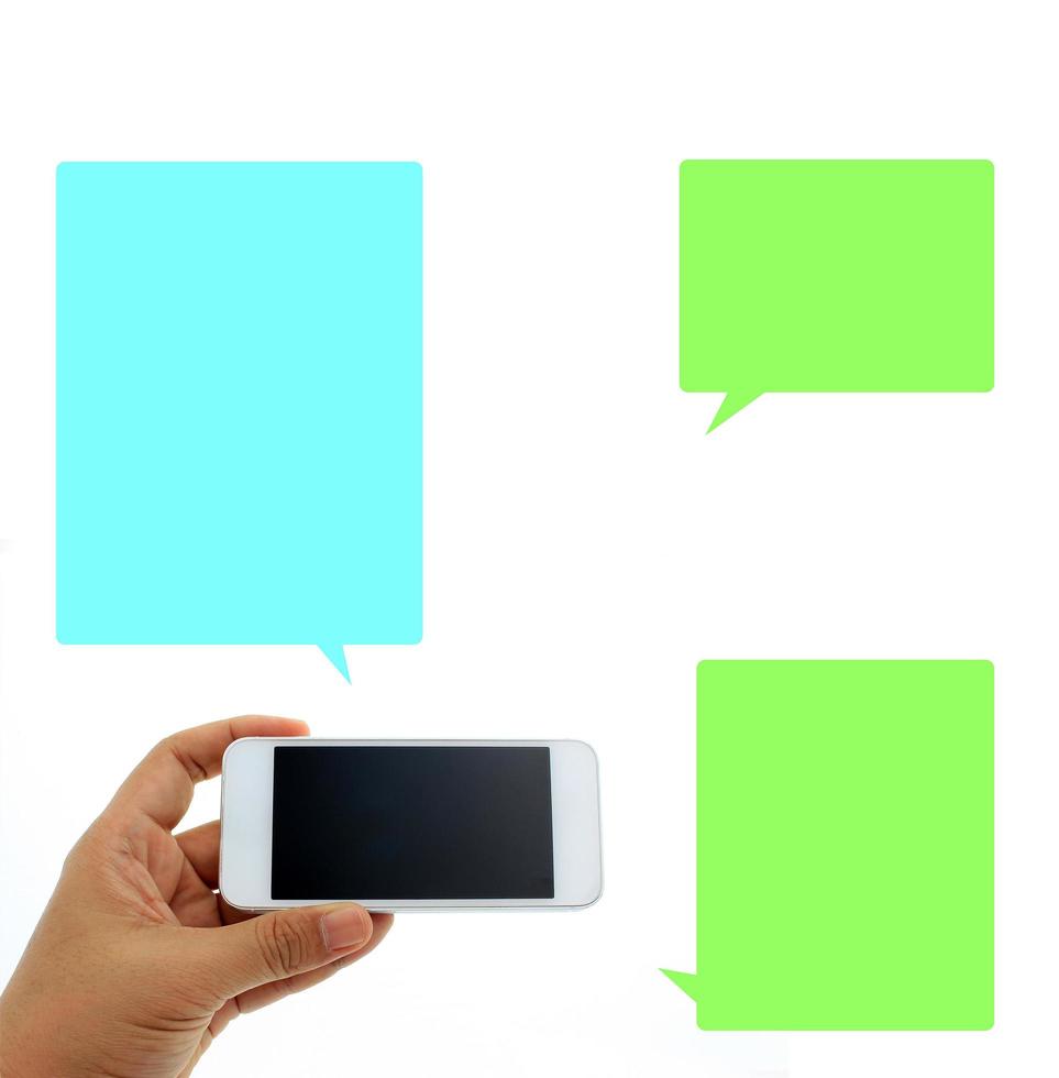 Person holding a phone with three colorful speech bubbles photo