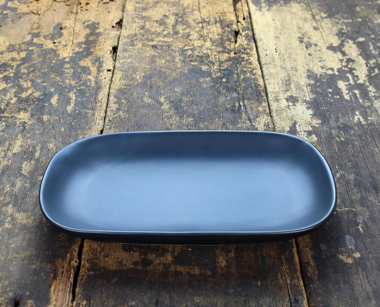 Round rectangular black plate photo