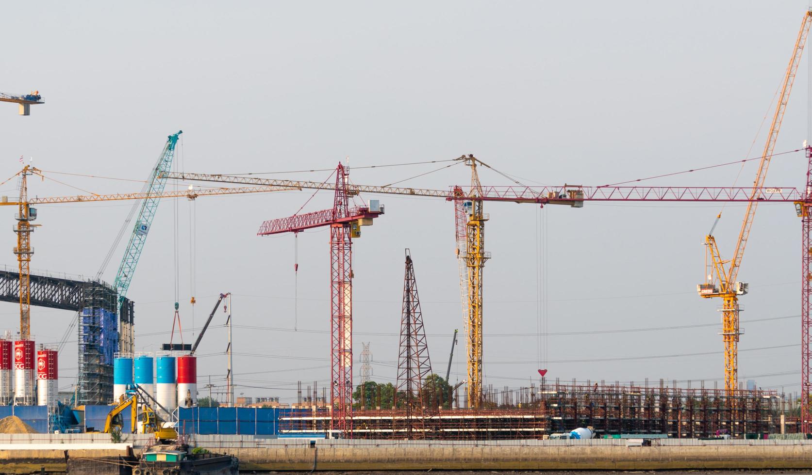 Construction cranes in Bangkok, Thailand photo