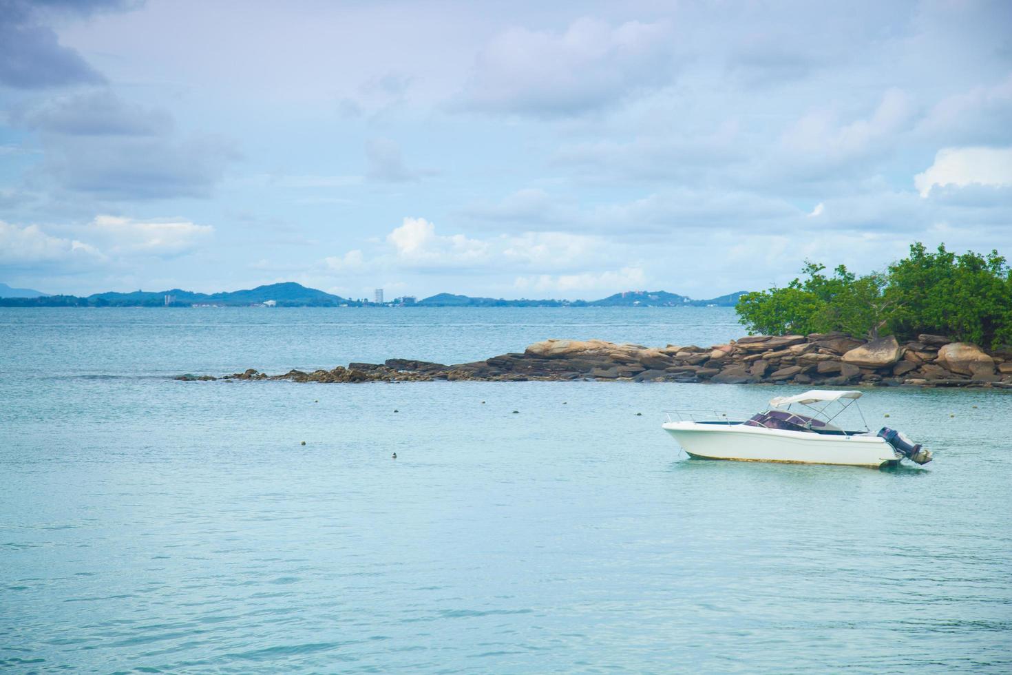 Boat moored at sea in Thailand photo