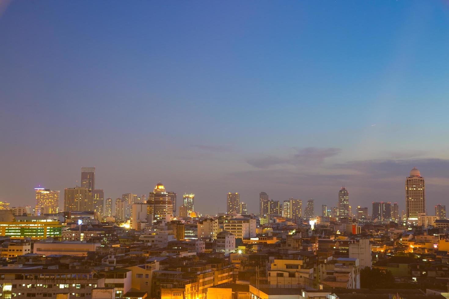 Skyscrapers of Bangkok at dusk photo
