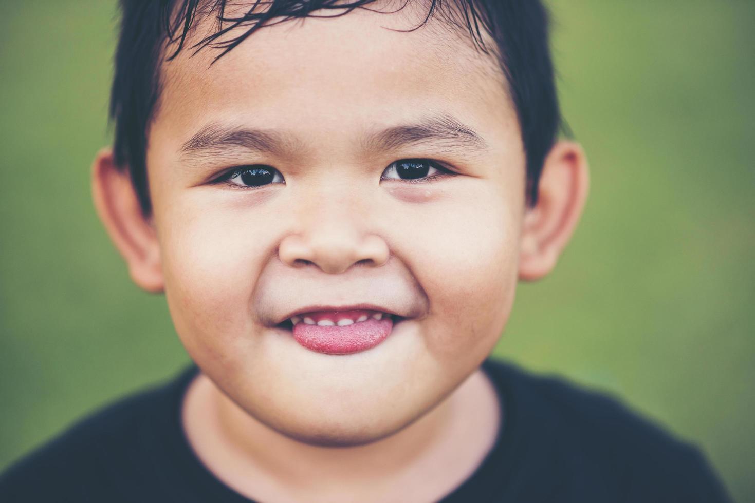 Portrait of happy boy smiling photo