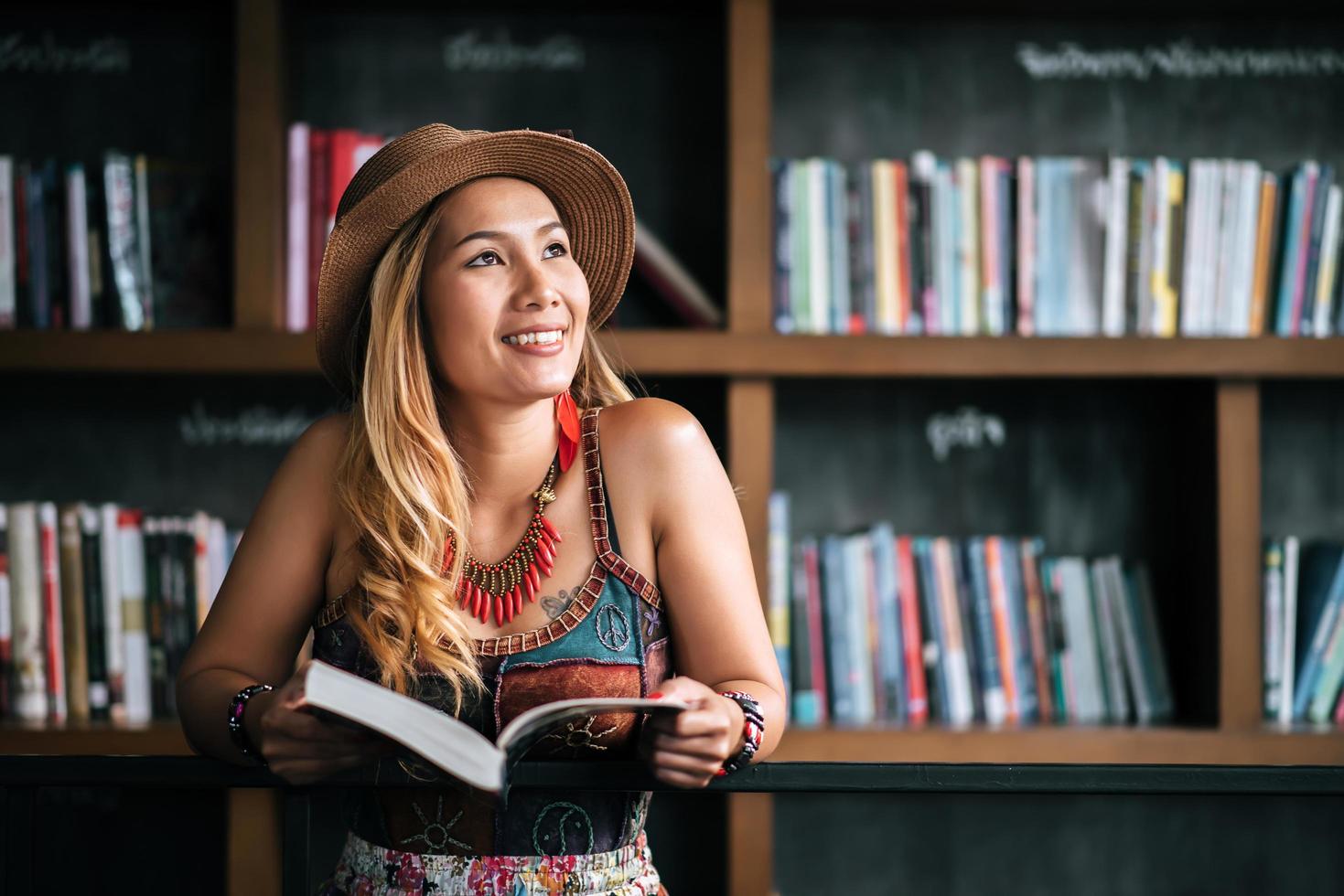 Young woman reading a book photo