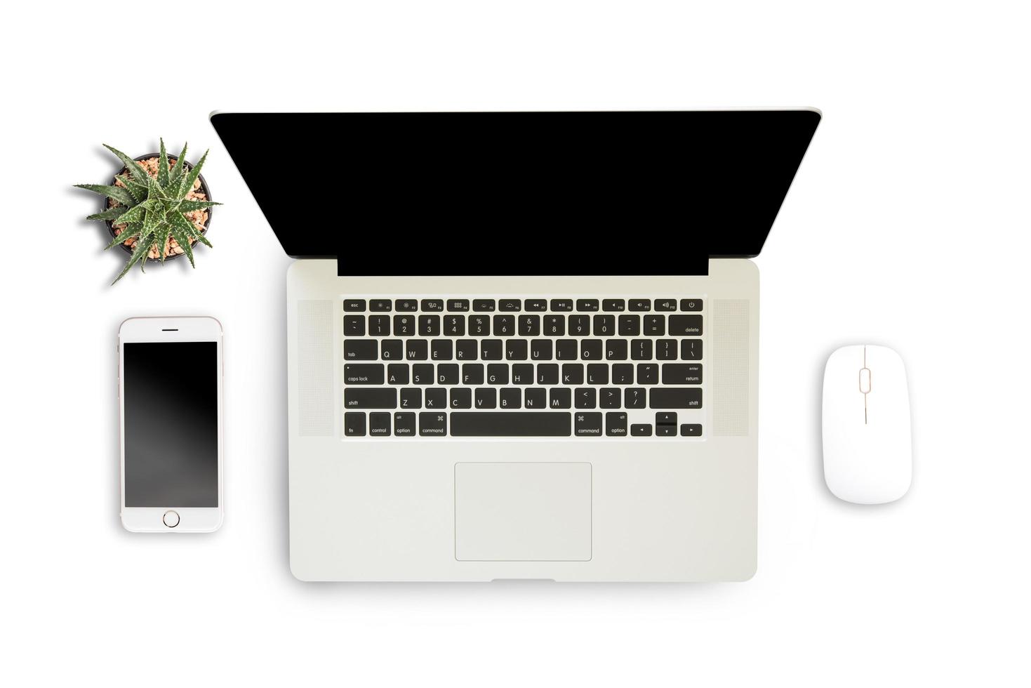 White background with laptop, smartphone and notebook photo