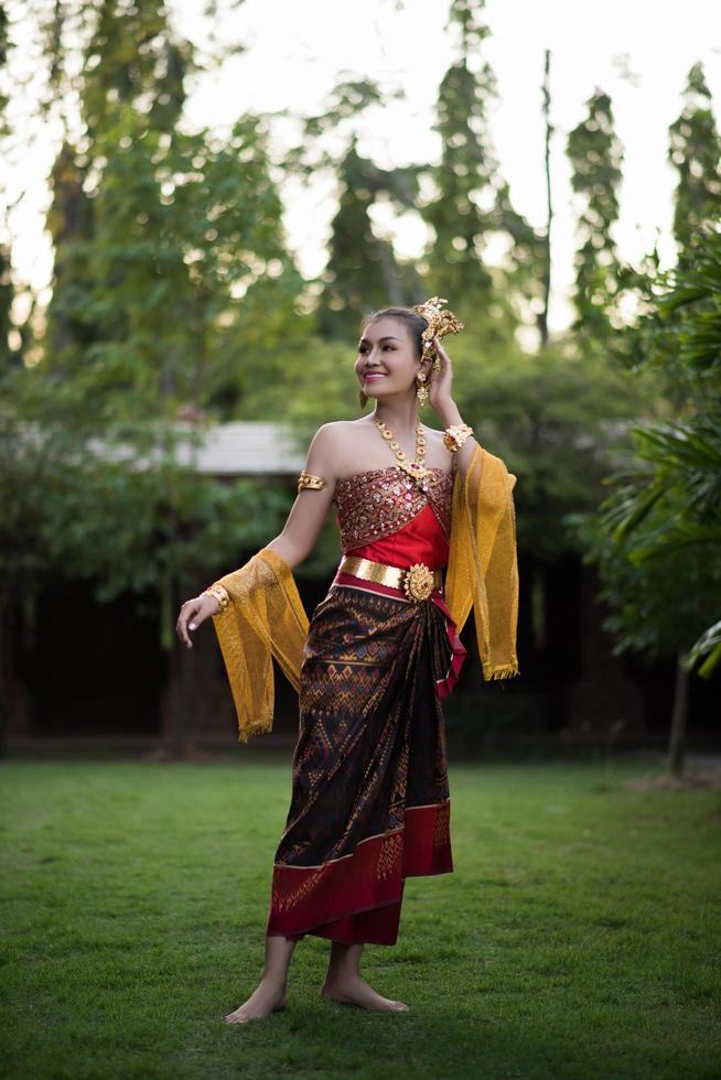 Woman wearing a typical Thai dress photo