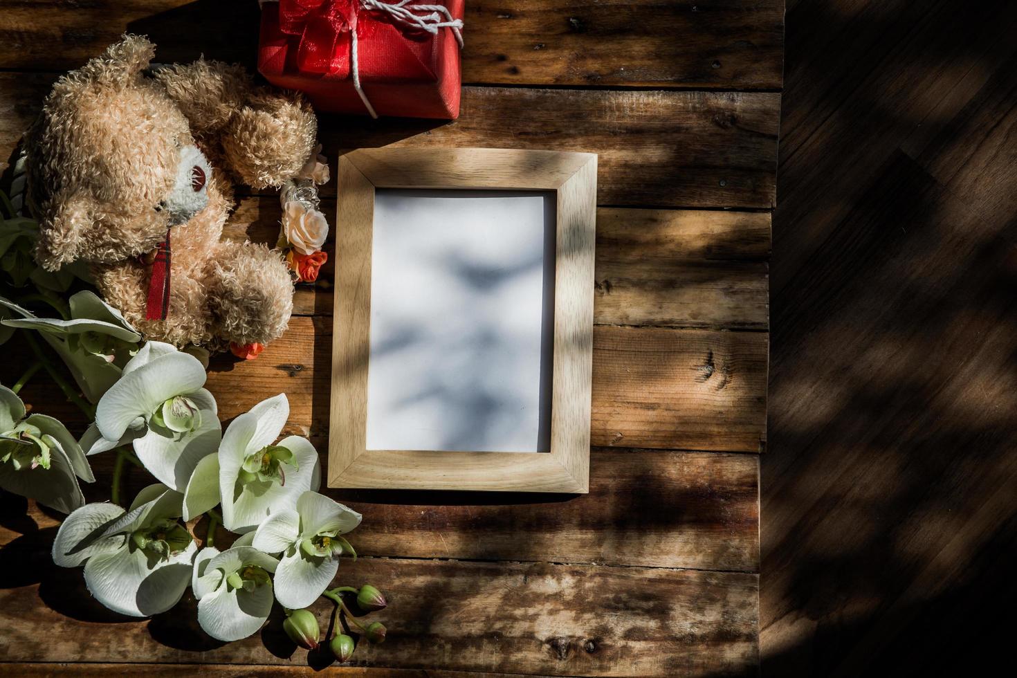 Top view of photo frame with tree shadow