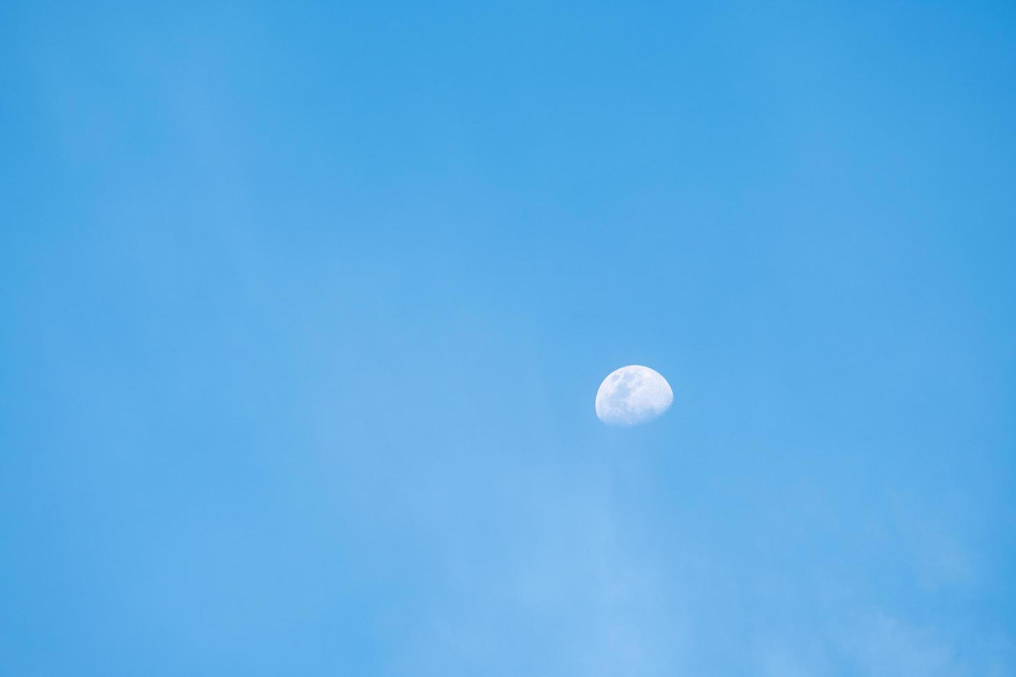 Half moon in twilight photo