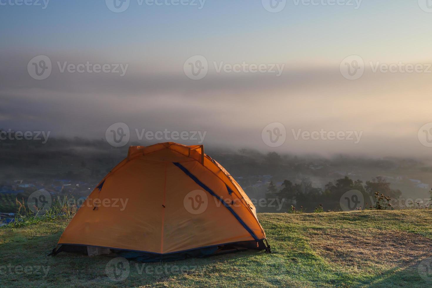 Orange tent at sunrise photo