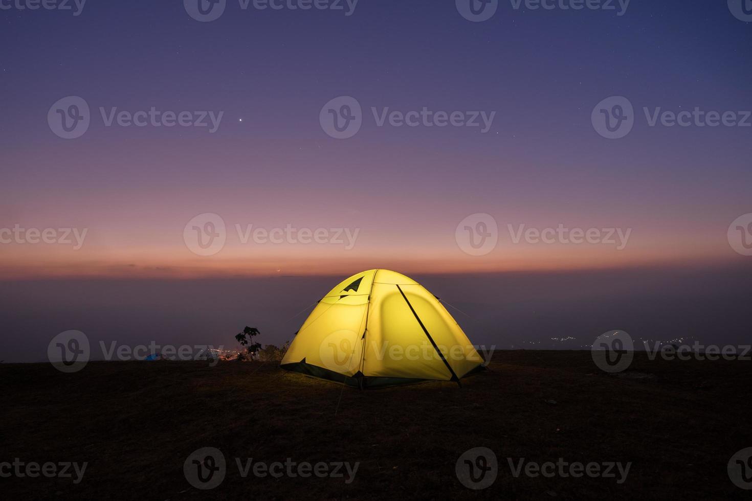 Yellow tent at night photo