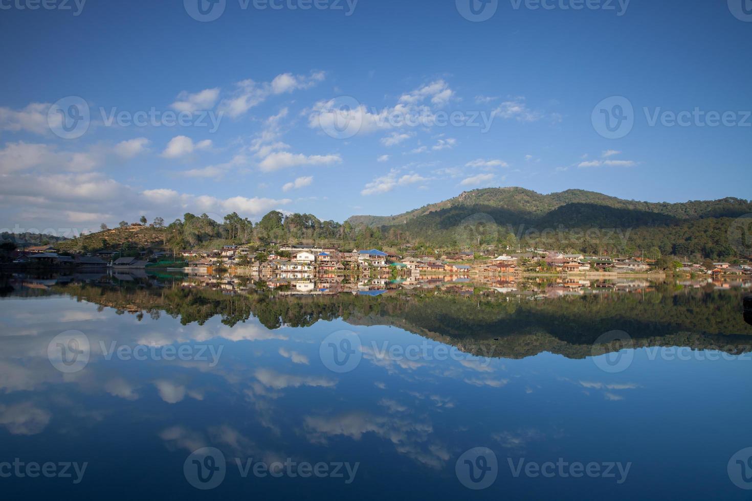 Village under a cloudy sky photo