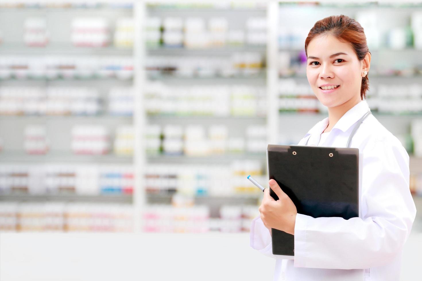 Female pharmacist, chemist, or medical doctor photo