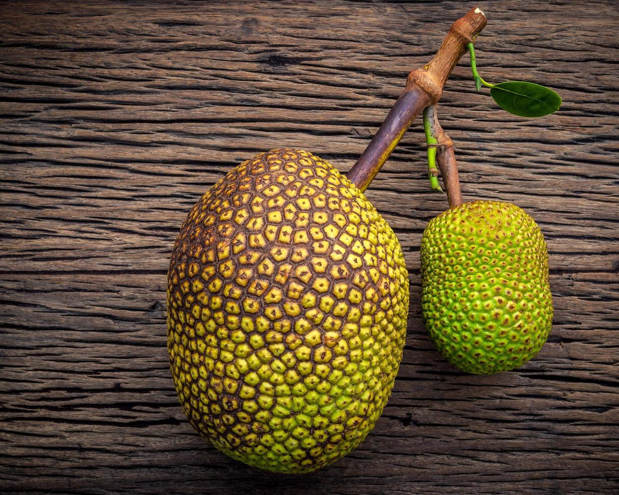 Jack fruit on shabby wooden background photo