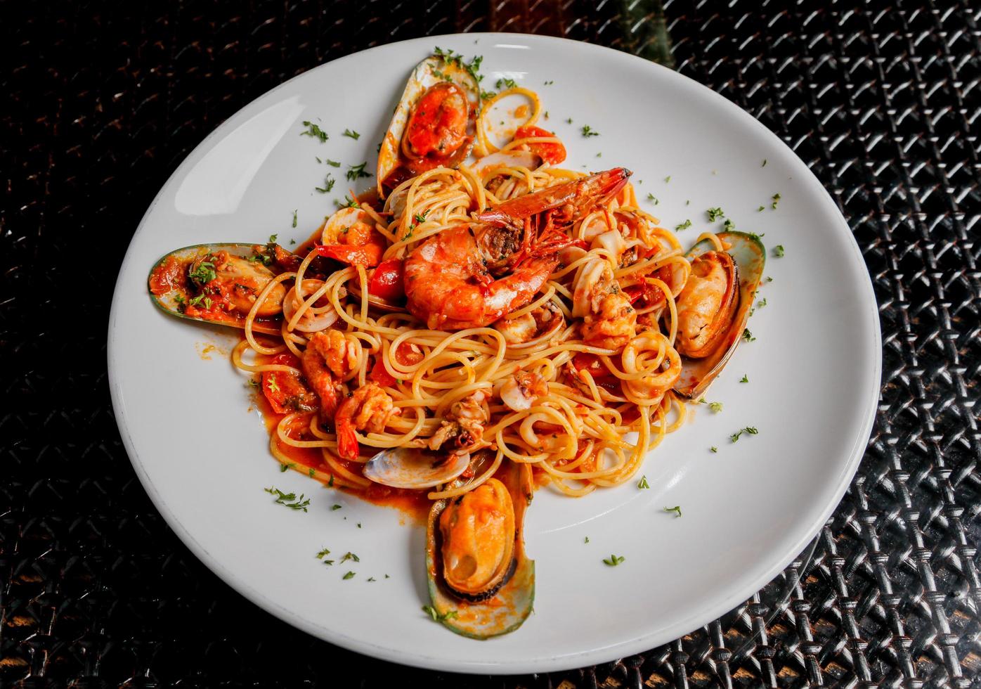 Seafood spaghetti dish photo