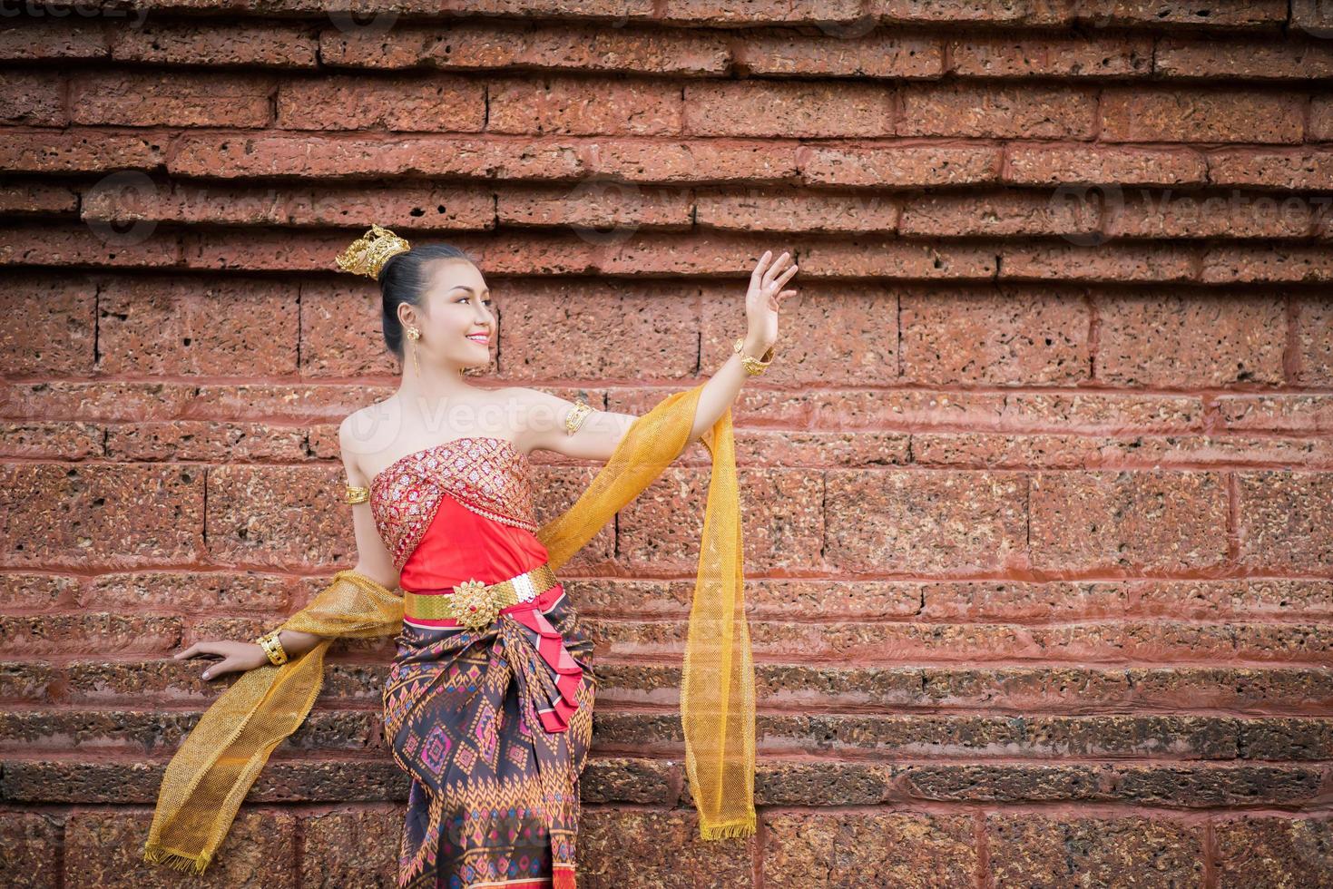 Woman wearing a typical Thai dress photo