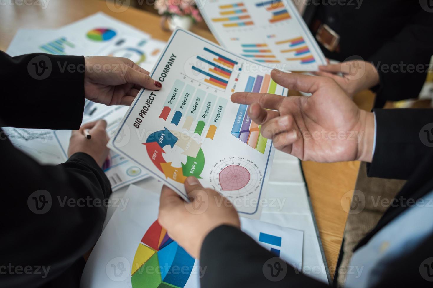 Business people working with business documents photo