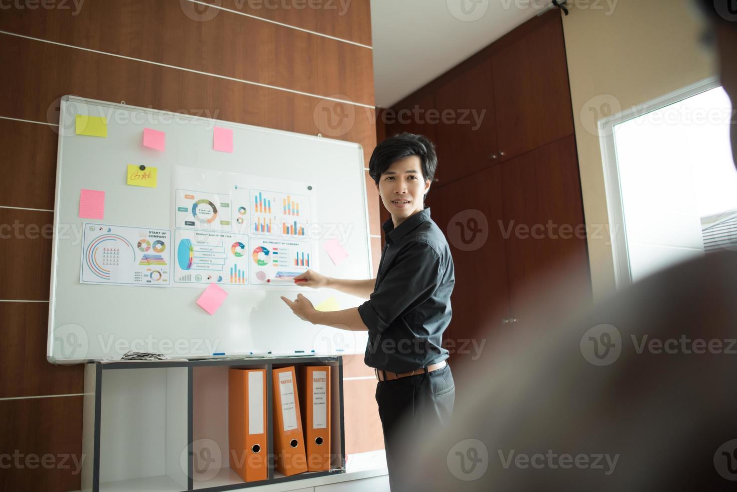 Businessman giving a presentation at work photo