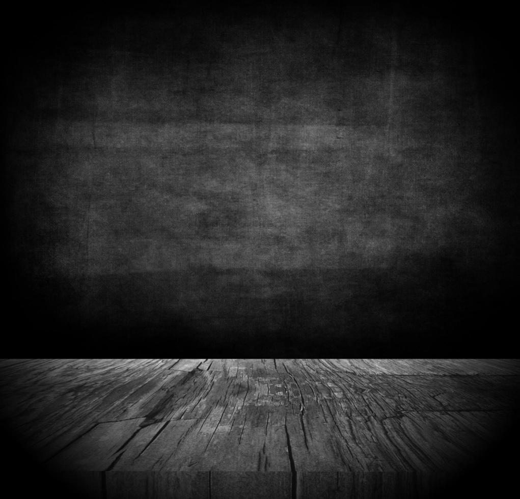 3D grunge background with dark wooden table photo