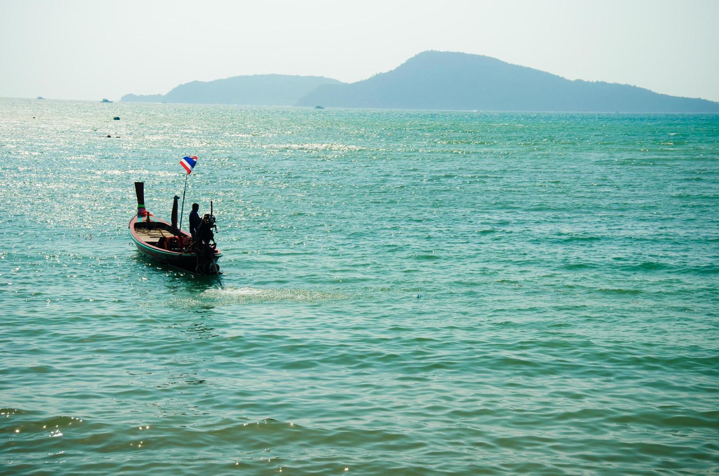 A boat out at sea in Phuket, Thailand photo