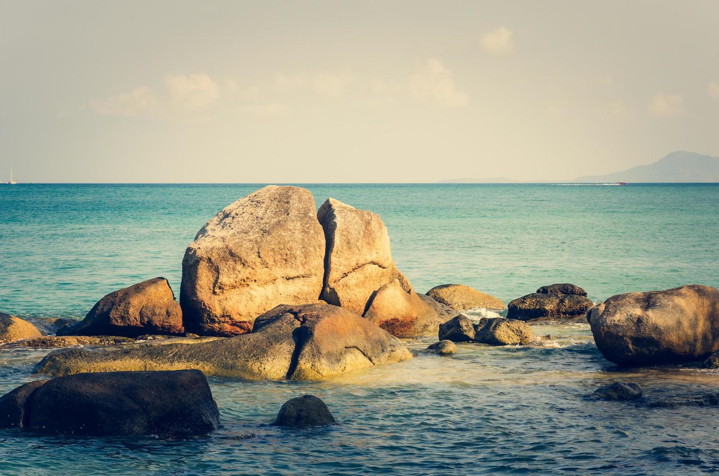 Rocks in the sea in Phuket, Thailand. photo