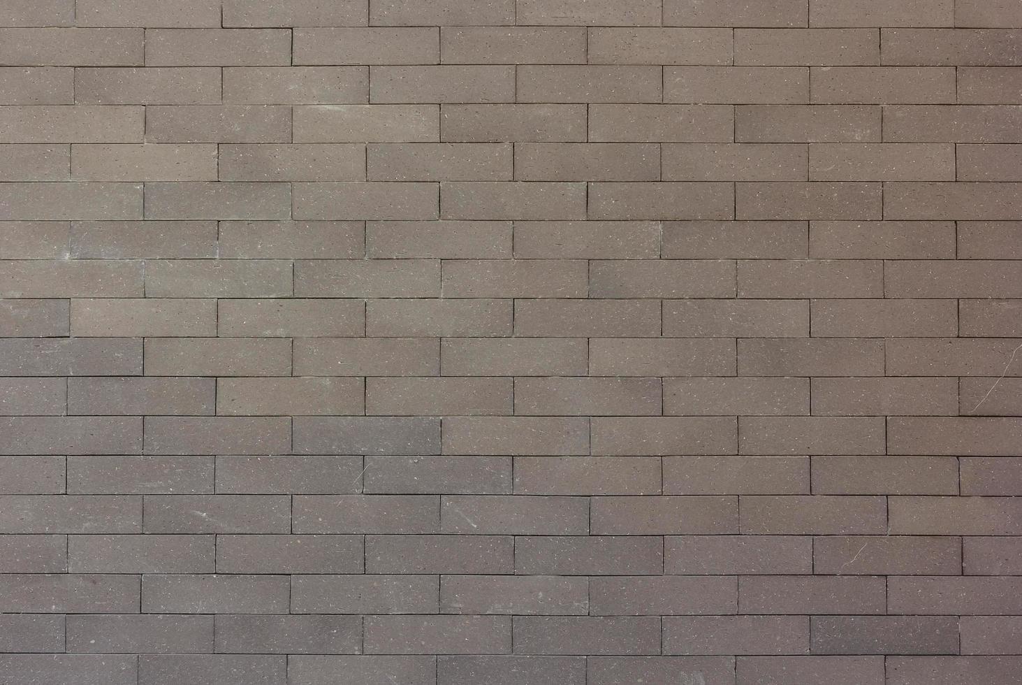 Gray brick wall texture for background photo