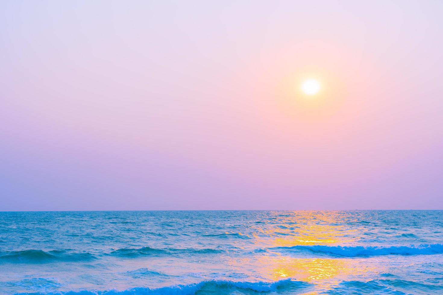 Beautiful tropical ocean at sunset or sunrise time photo