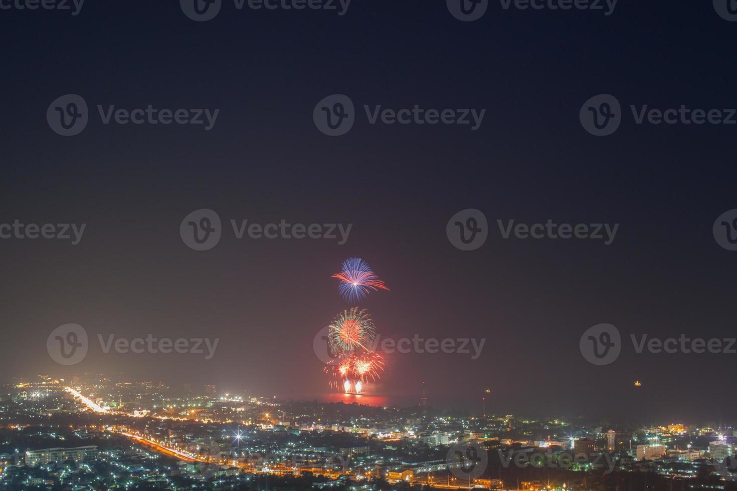 Fireworks above a city photo