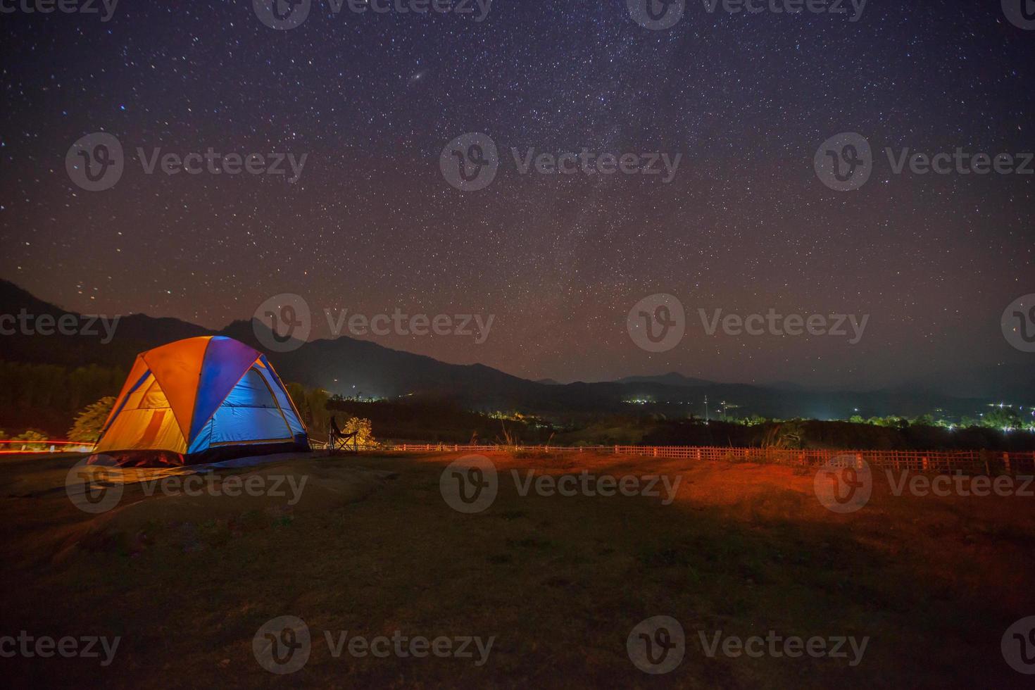 Colorful tent and starry sky photo