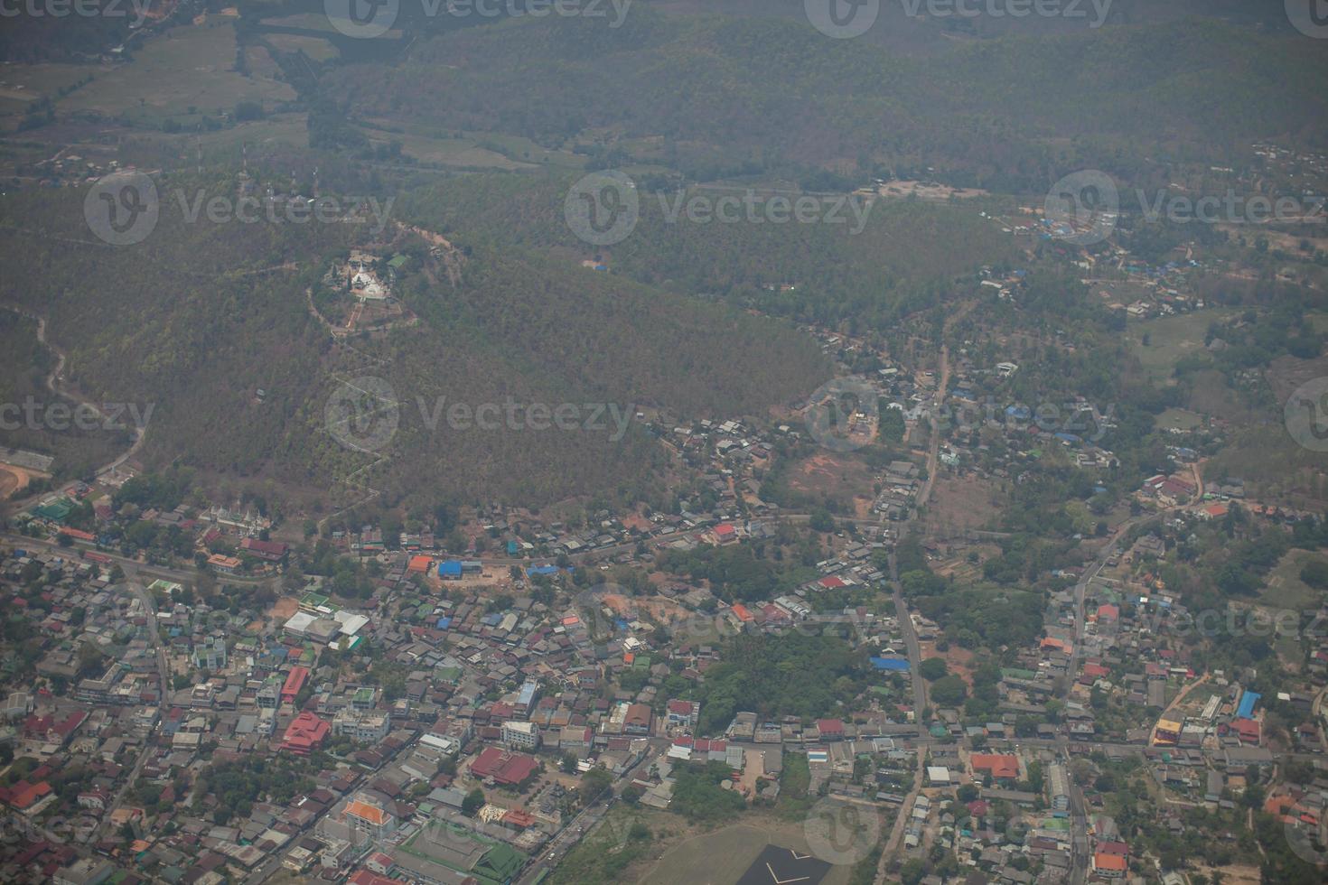 Aerial view of a village on a hill photo