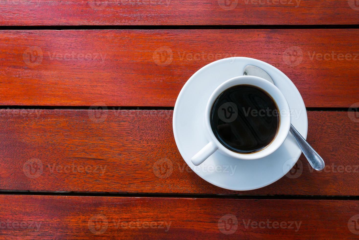 Coffee on a wood table photo