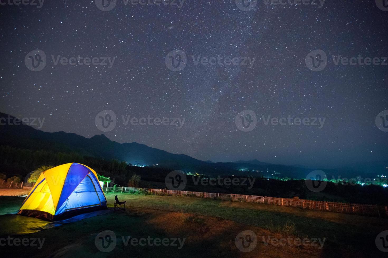 Colorful tent and a starry sky photo