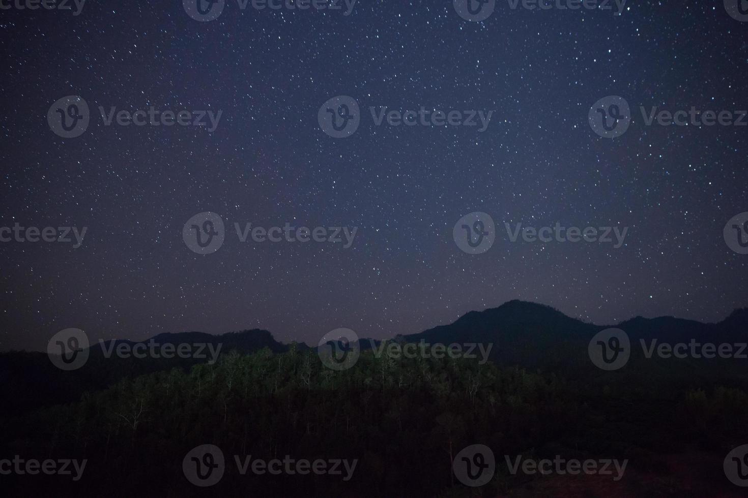Starry skies and mountains photo