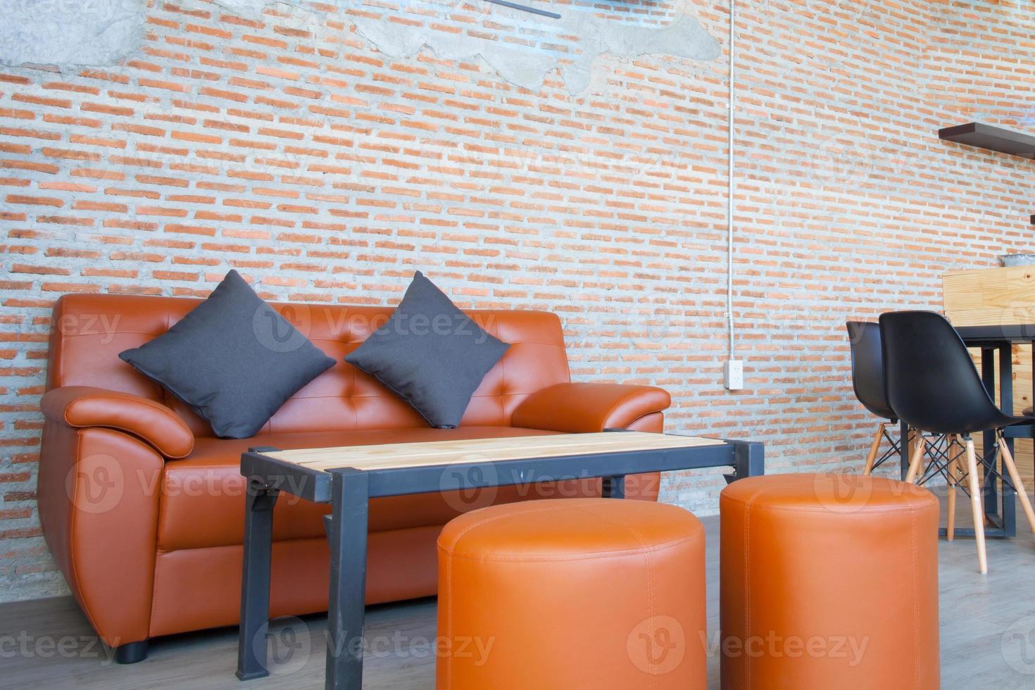 Sofa and chairs with a table photo