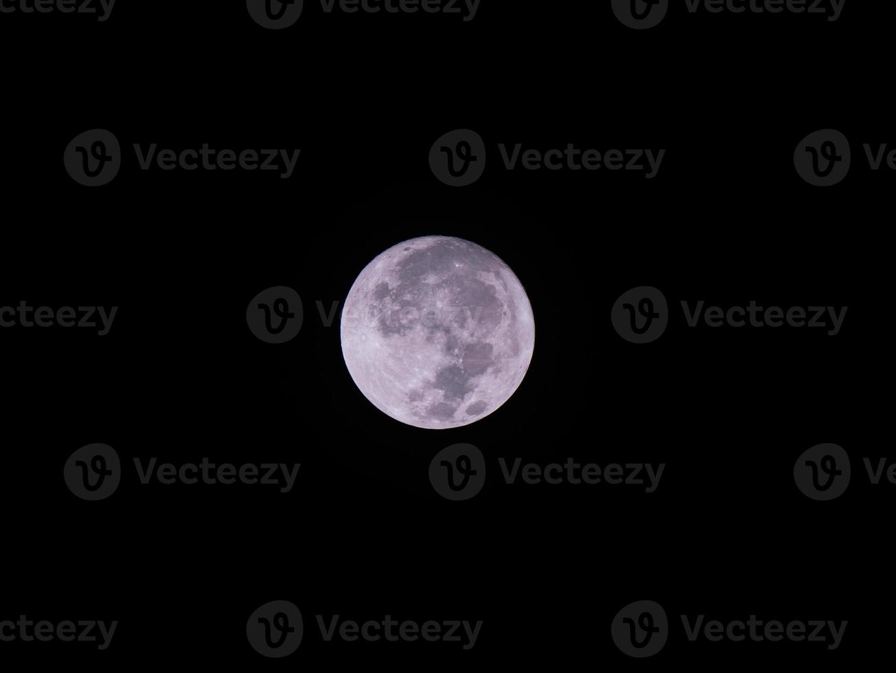 A full moon on clear dark sky photo