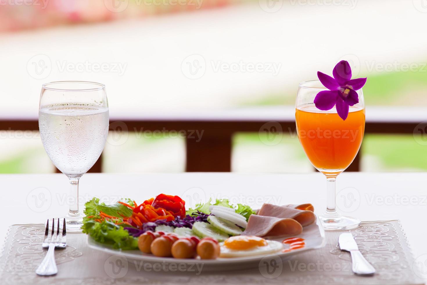 Breakfast on a table outside photo