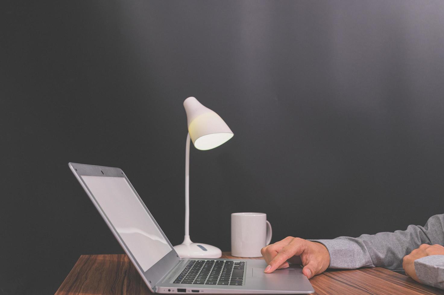 Businessman using laptop computer photo