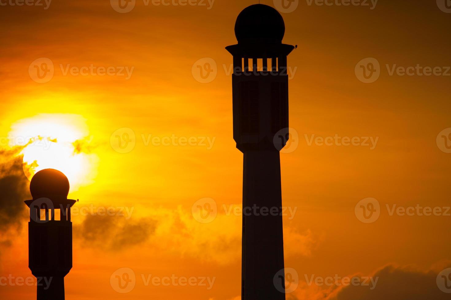 Silhouette of a mosque at sunset photo