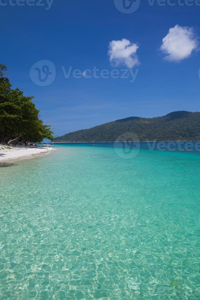 Clear water with white clouds photo
