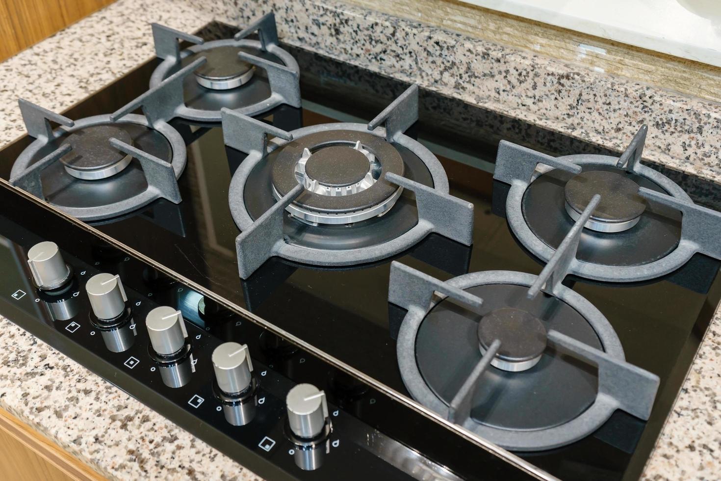 Close up of gas stove in the kitchen photo