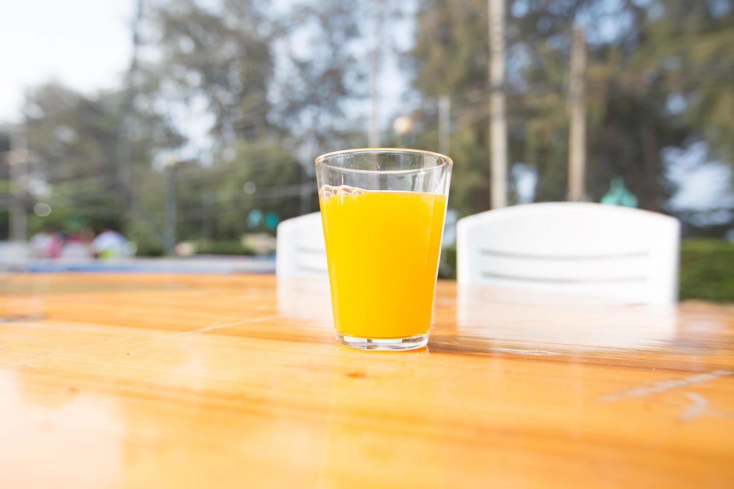 vaso de zumo de naranja foto
