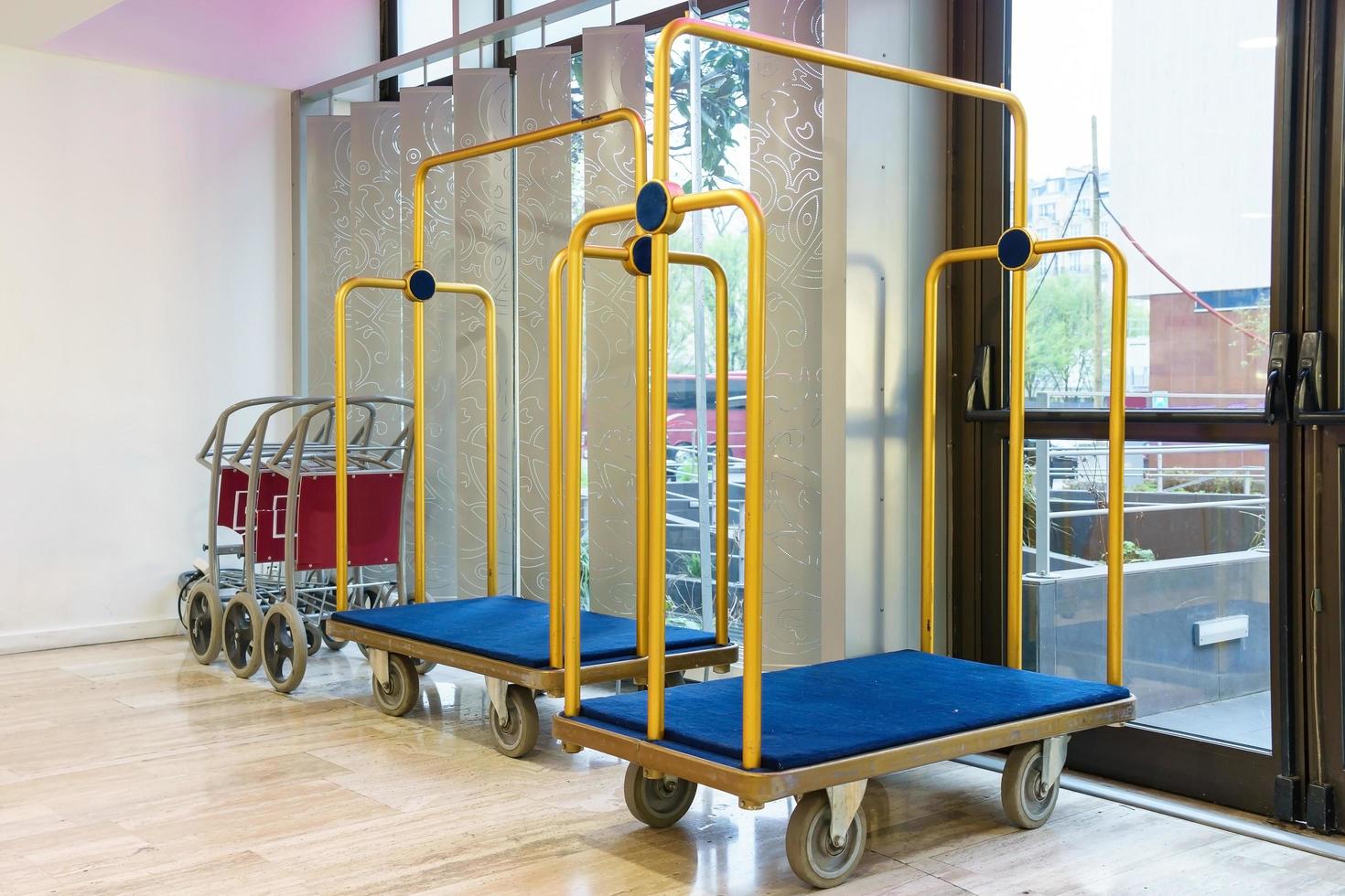 Hotel luggage carts or baggage trolleys photo