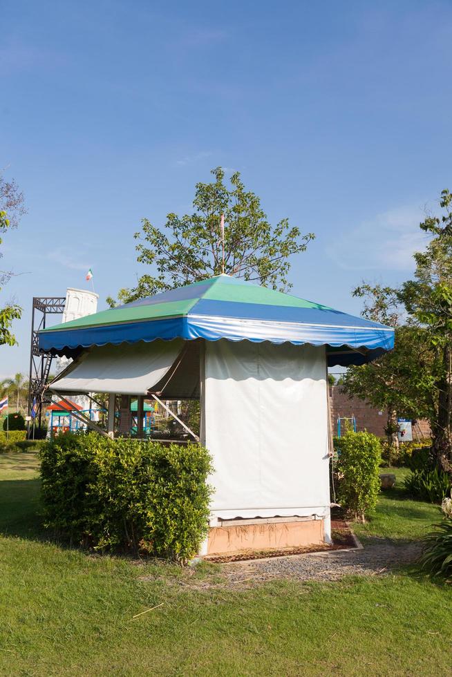 Canvas tent on the lawn photo