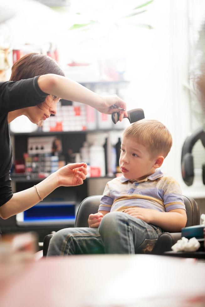 Boy getting a haircut photo