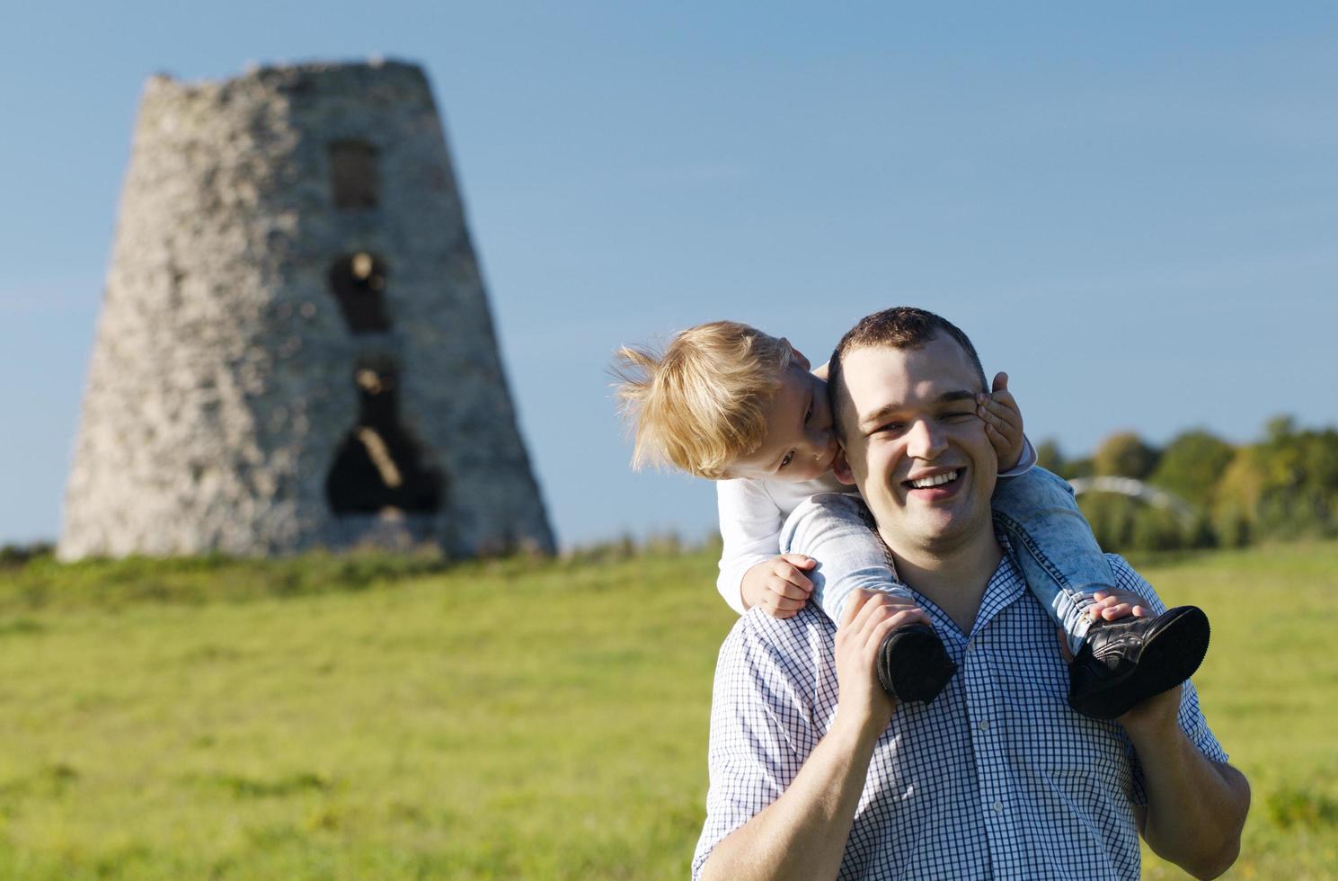 Father and son playing outside photo