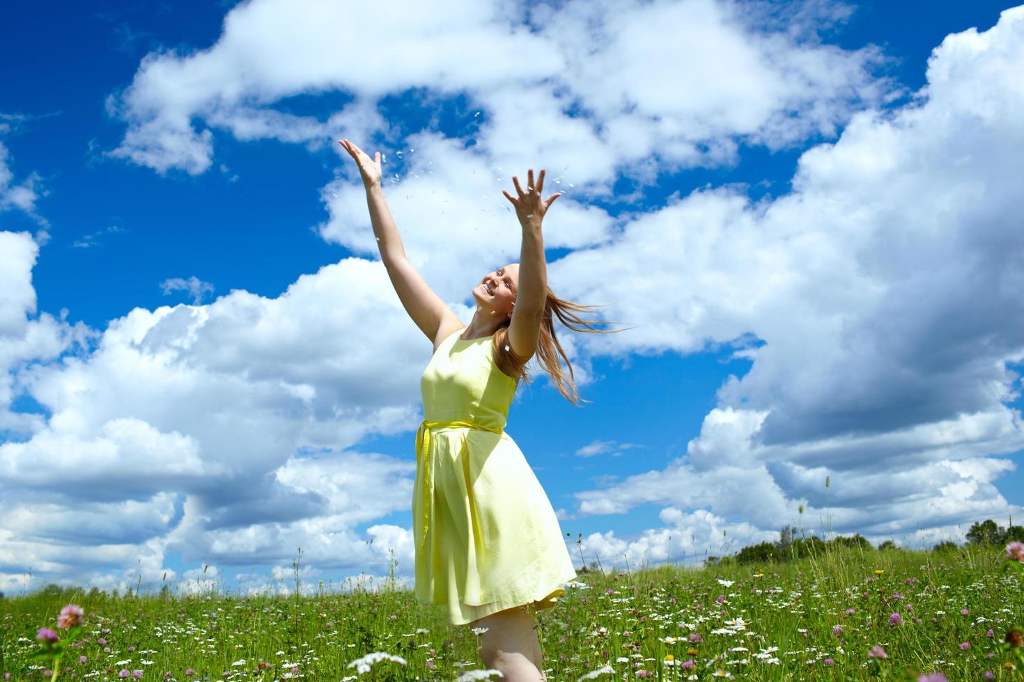 Woman in a yellow dress outside photo