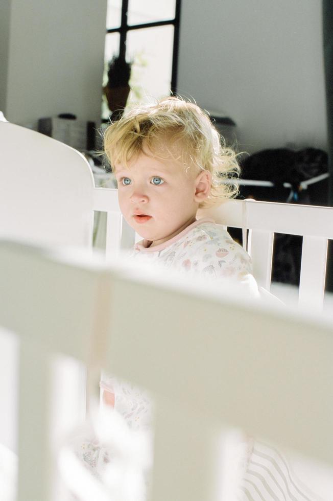 Baby in a crib photo