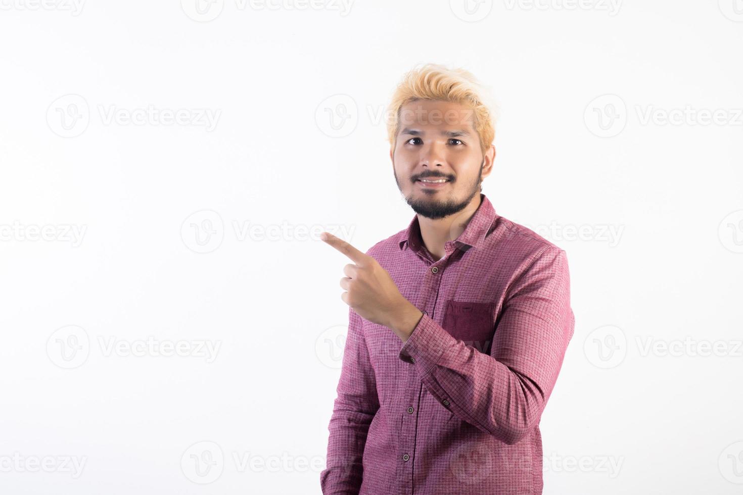 Portrait of a handsome hipster man standing isolated on white background photo