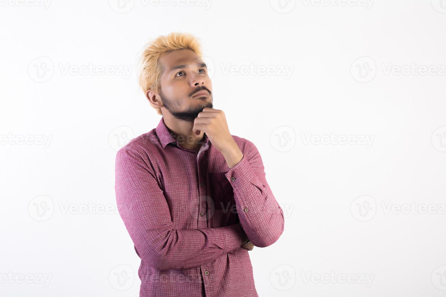 Portrait of a handsome hipster man standing isolated on white background photo