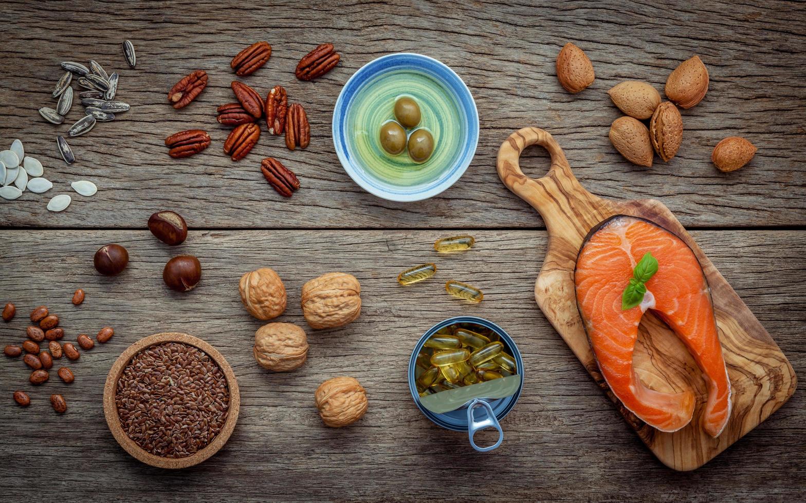 Omega 3 foods on a wood background photo